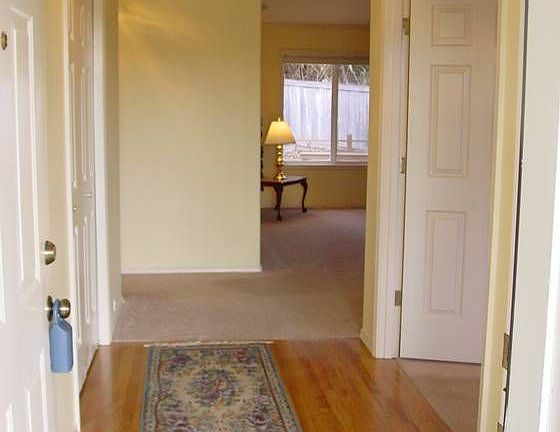 Hardwood Entry / Den on Right