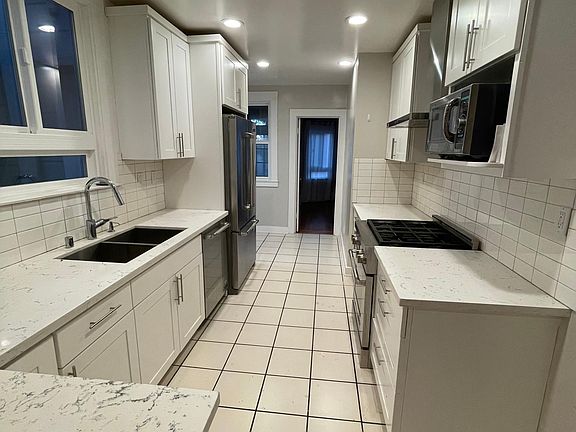 Bright kitchen with new appliances.