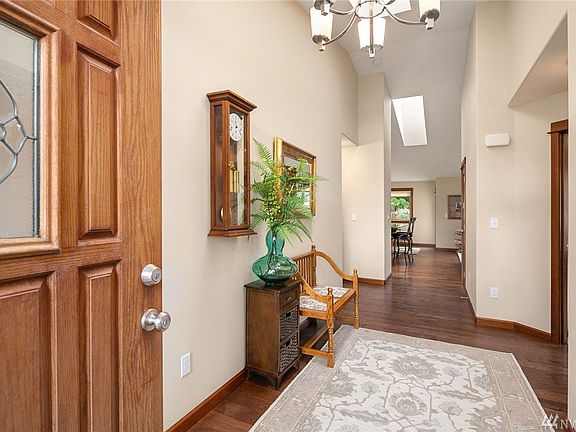 Spacious and inviting entry into the long hallway