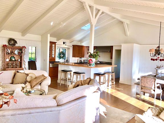Great room with plenty of fabulous seating and convenience to kitchen, dining and patio.