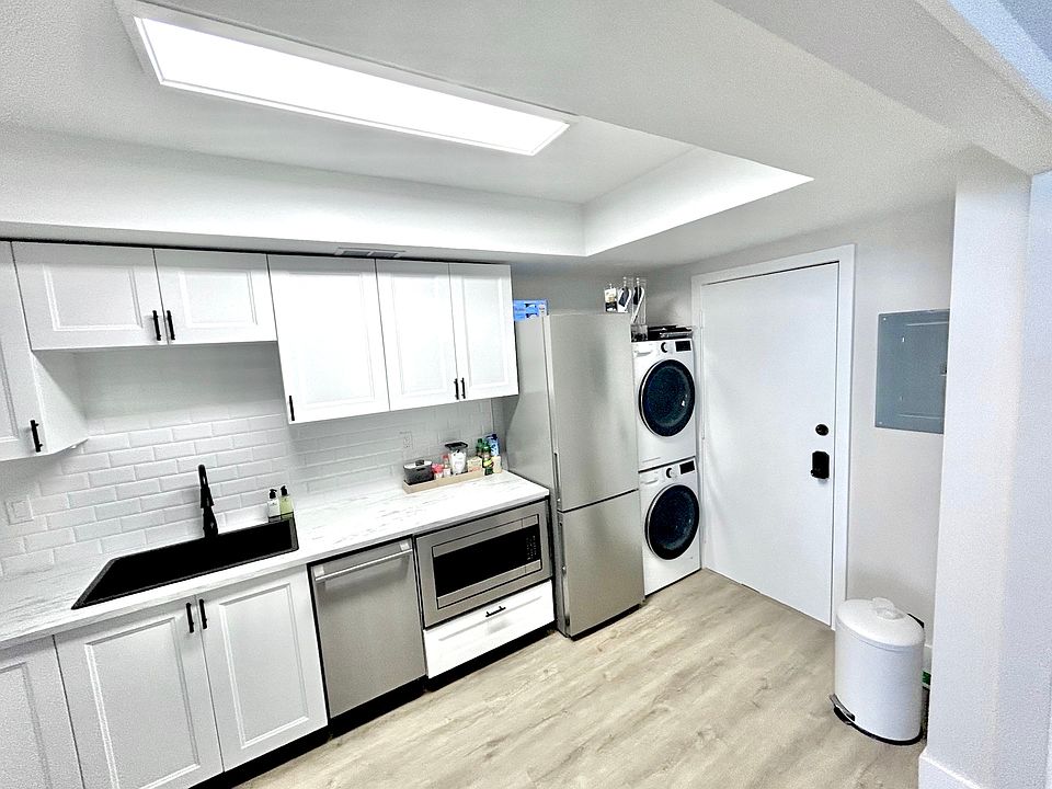 Stacked Washer and Dryer for your convenience inside your home.