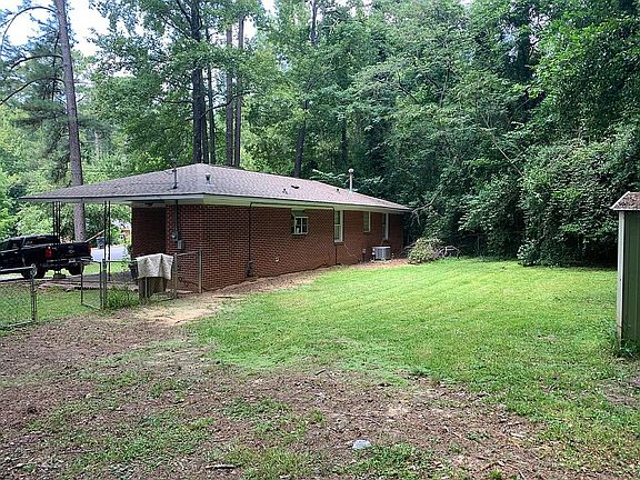 Back of house, with storage shed.