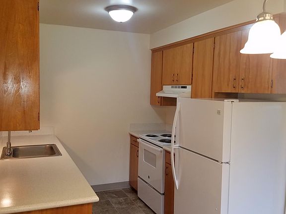 Fully renovated kitchen including new countertops and appliances.
