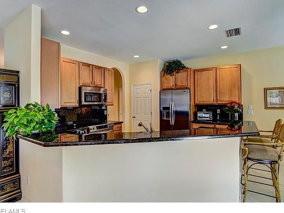 Eat in kitchen at the bar.