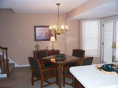 Gorgeous dining area opening to elevated patio