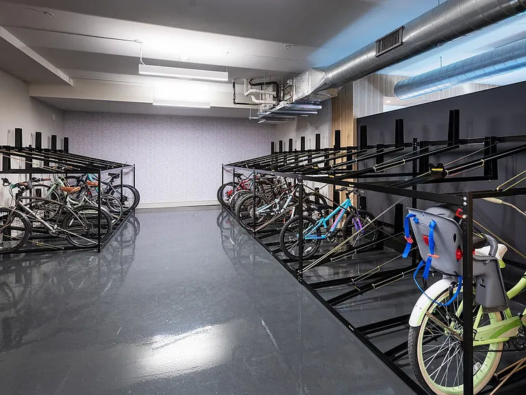 Secure bike storage with fix-it station.