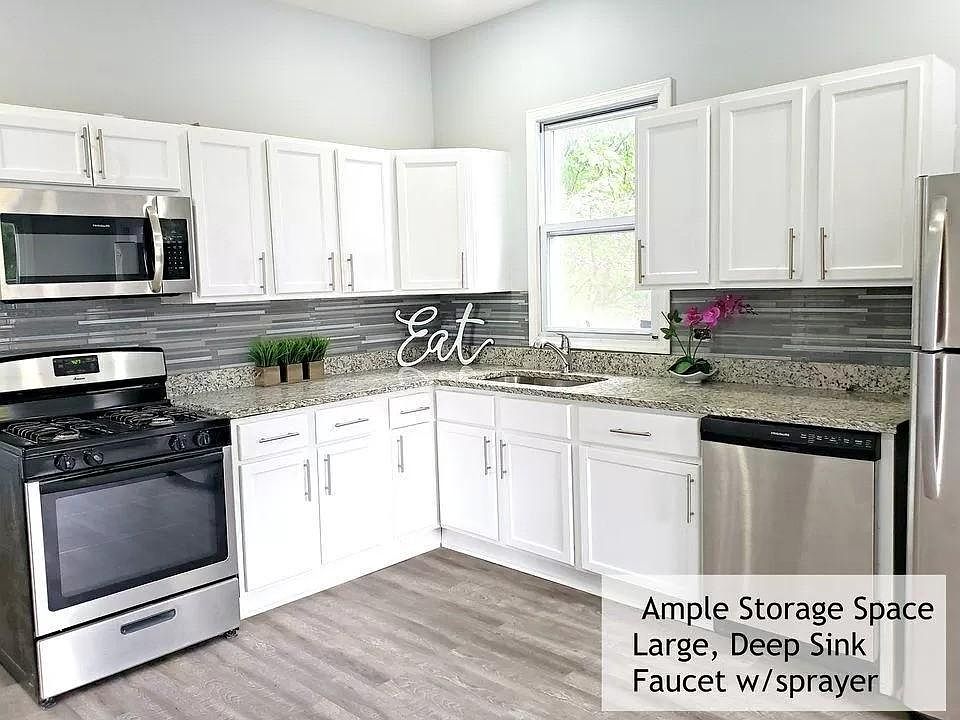 Updated kitchen with all new appliances, countertop, and cabinets
