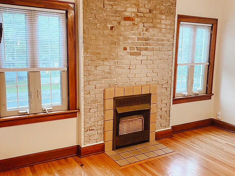 Living room with decorative fireplace