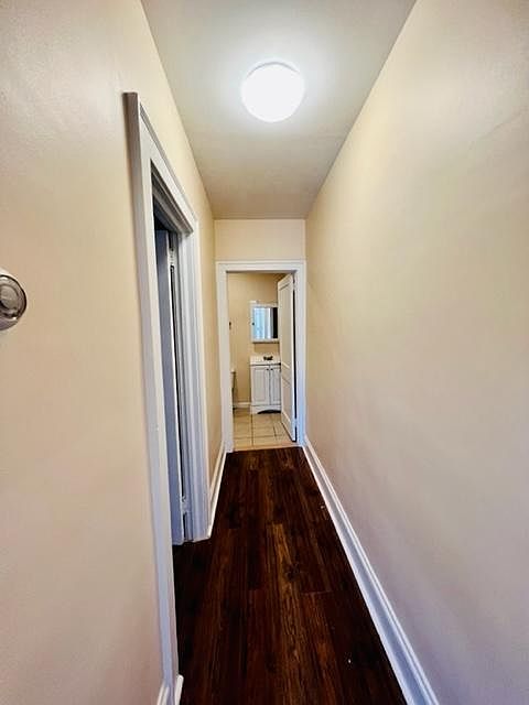 Hallway to bedroom and bath