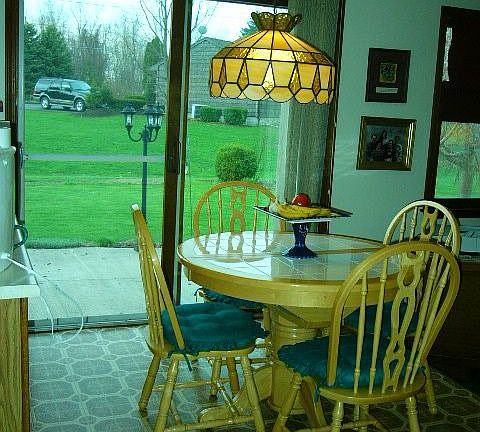 Eat in kitchen leads to patio