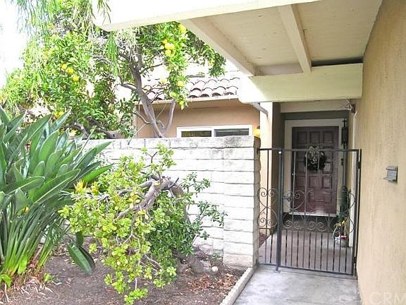 Gated front courtyard with garden inside