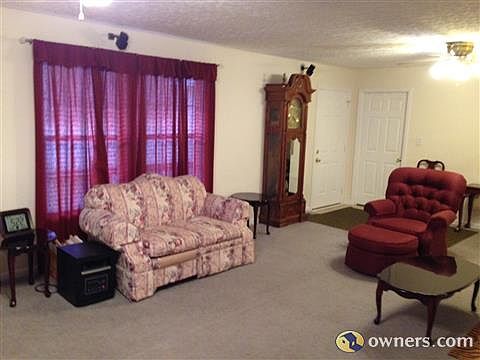 Living Room w/entrance to garage via Laundry Roomm