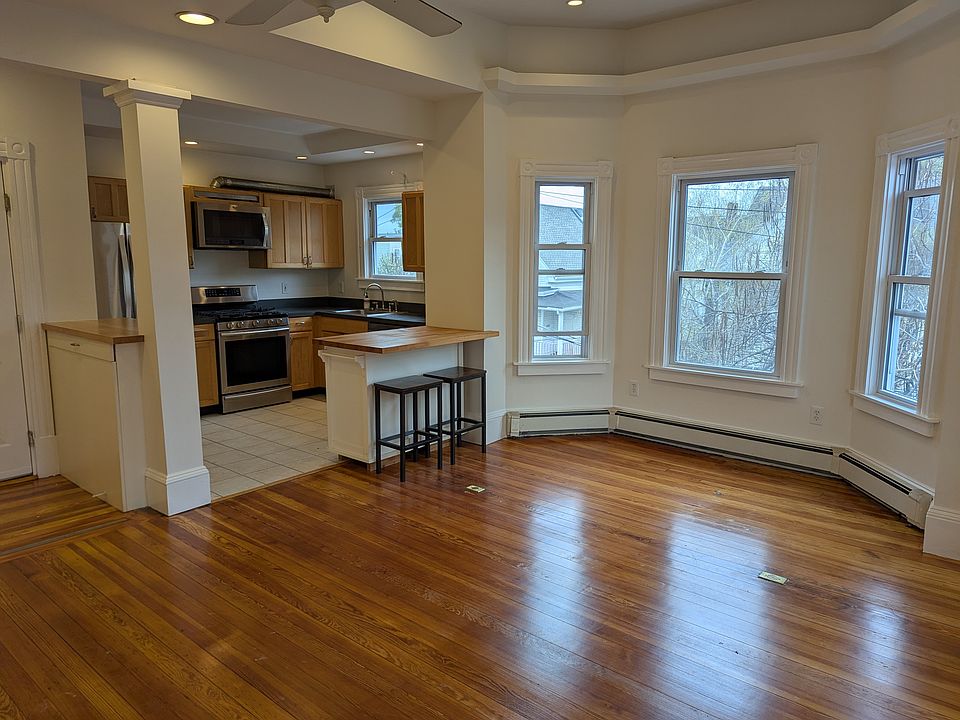 Living/dining room, with open kitchen.