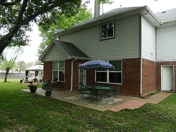 You'll love the multiple patio areas, trees, and large backyard.