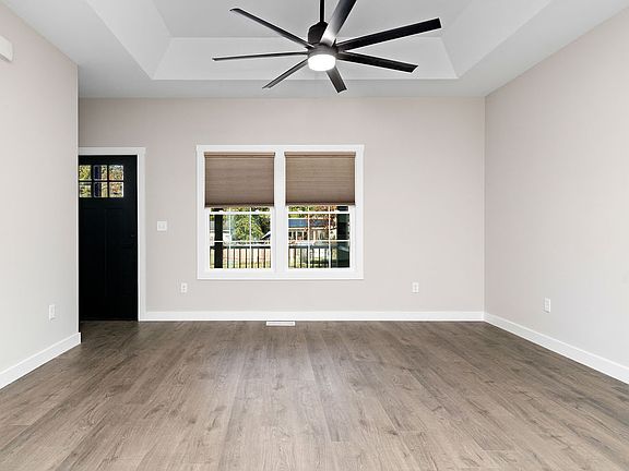 Living room pre-wired for wall mount TV (to the left unseen in this photos).