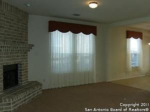Open, Bright Living Room with Fireplace