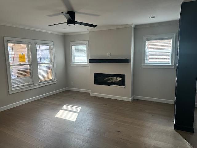 Living room with electric fireplace that does emit heat.