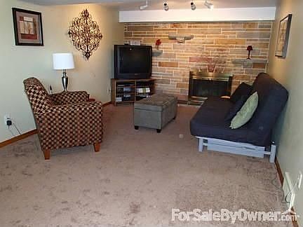 Family room
						:
						Relax with a cozy fire in your wood burning fireplace!