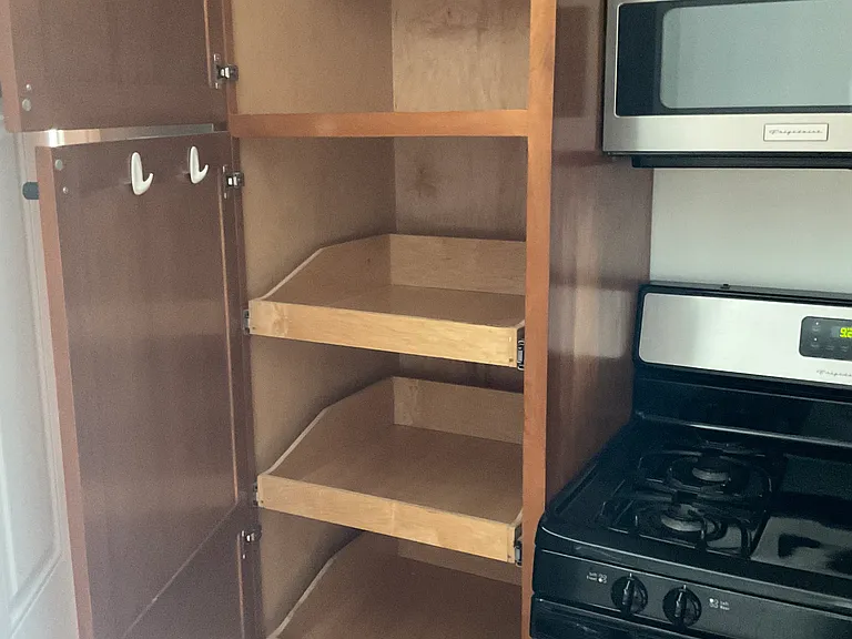 Pantry and lower cabinets have pull out drawers