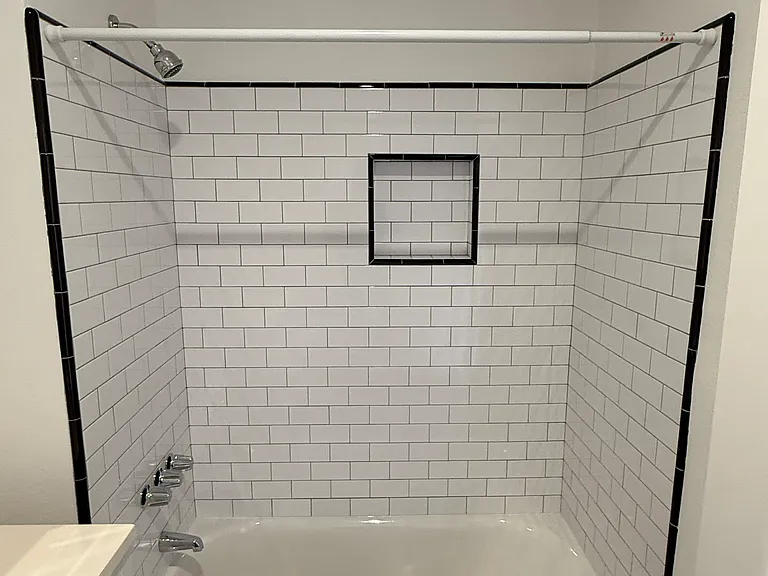New vintage style subway tile with Shower niche and all new tub