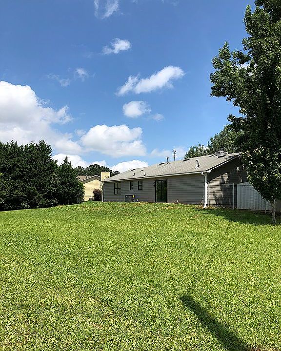 Rear of home.  Large yard
