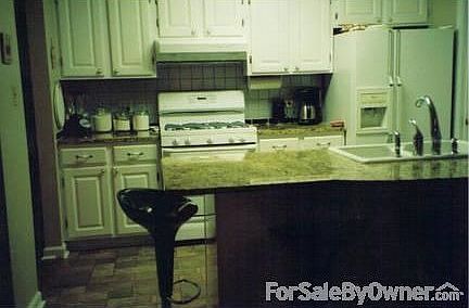 Kitchen Island
						:
						New dishwasher, porcelain sink, granite, faucet, disposal, seats 4 with stools.