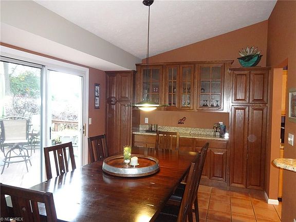 Custom built-ins with granite countertops in dining area - great for additional storage and entertaining!