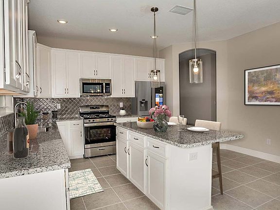 Sanibel new home plan kitchen area by William Ryan Homes Tampa
