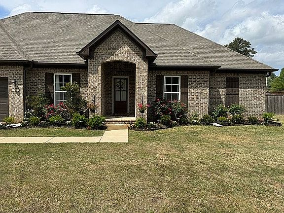 House with Flower Beds