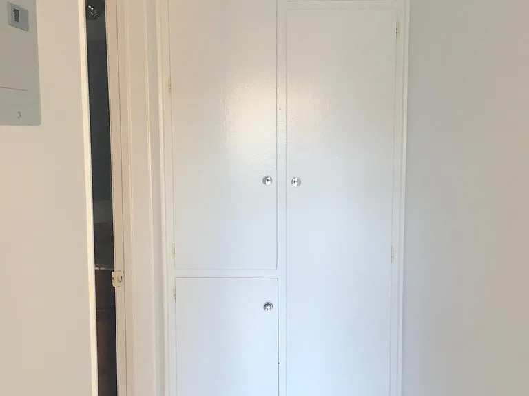 Additional storage space in hall linen cabinets.