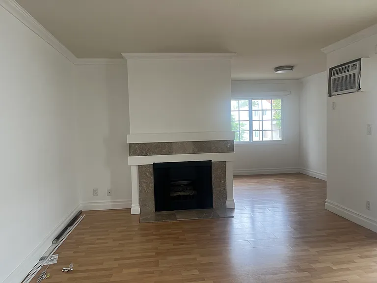 MAIN ROOM W/ WORKING FIREPLACE