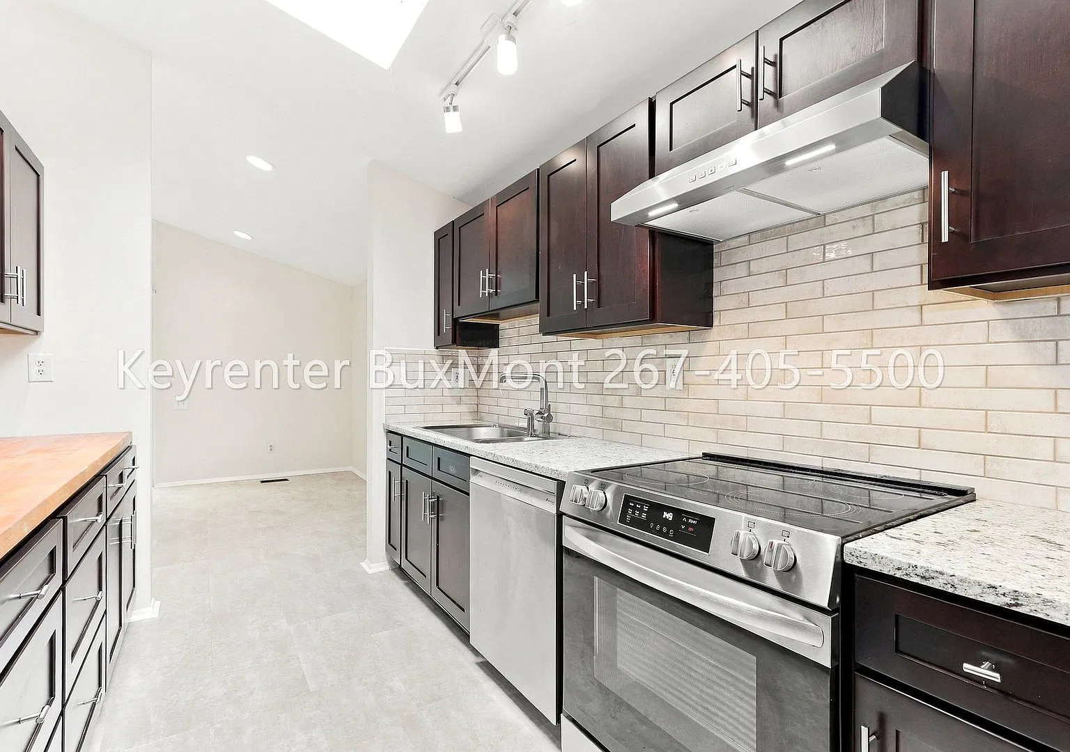 Bright and spacious single-family home with tons of windows, vaulted ceilings, and skylights — Photo 3