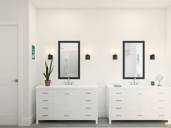 Primary bath with dual sinks and chrome fixtures throughout