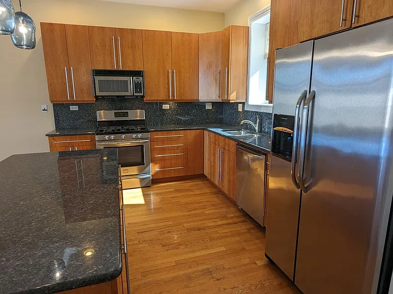 The living areas have been freshly painted in a lighter neutral tone