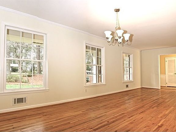 Living Room/Dining Room Has Lots of Light & View To Front Yard