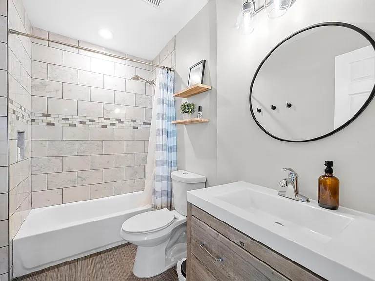 Indulge in a luxurious experience where modern amenities meet classic charm. Enjoy the luxury of a tub-shower combo, offering both relaxation and functionality. Immerse yourself in a soothing bath or opt for a quick shower in this thoughtfully designed sp