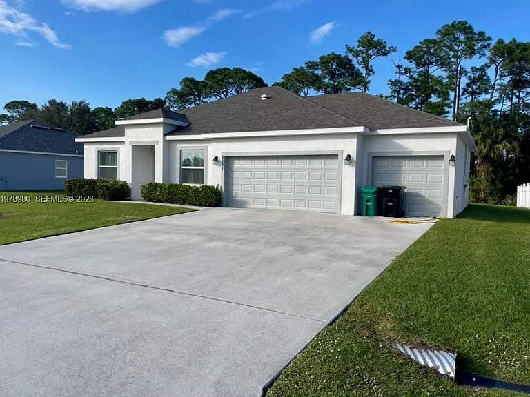 6157 NW Gatun Dr — Photo 1