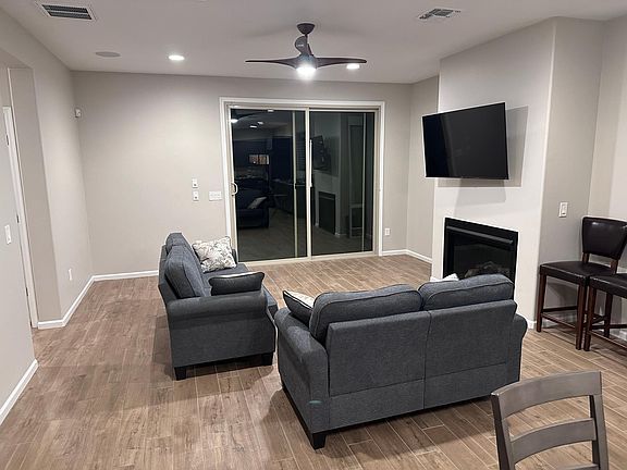 built in gas fireplace, flat screen TV mount and recessed lighting