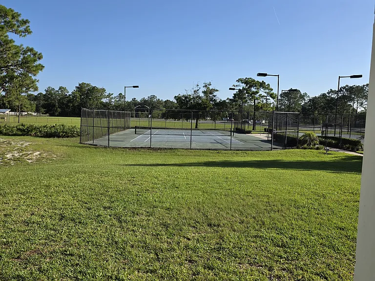 Tennis courts and part of baseball field