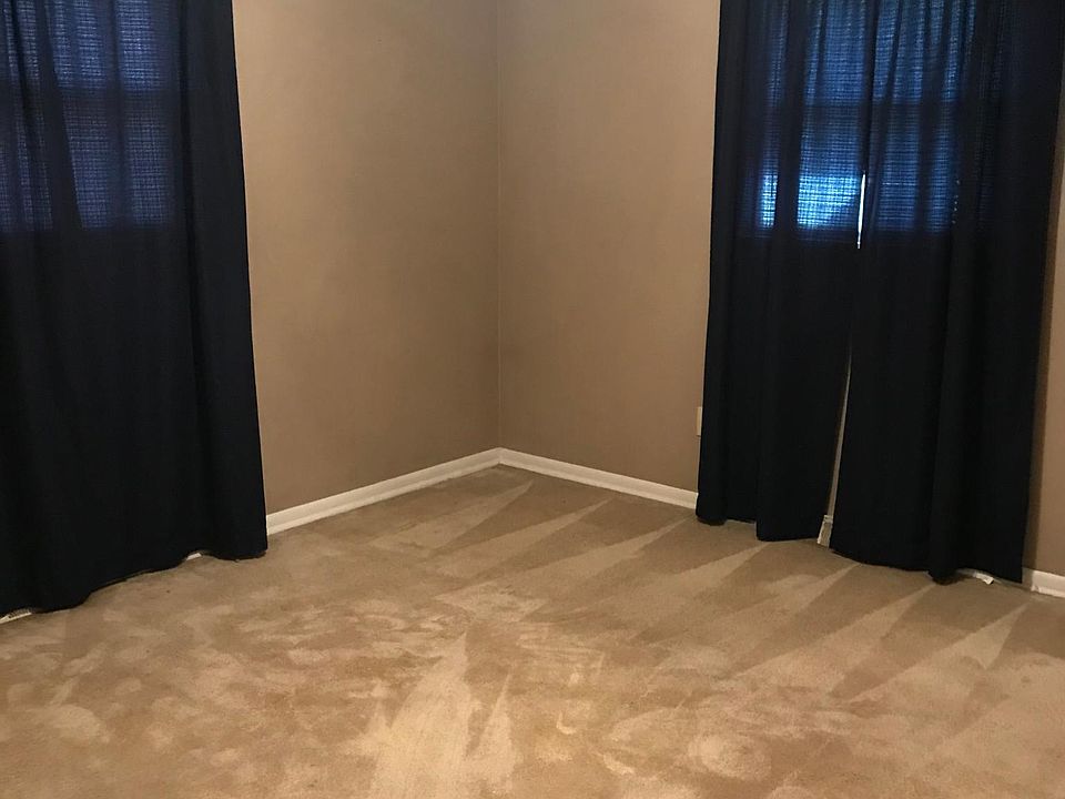 Master bedroom with half bath