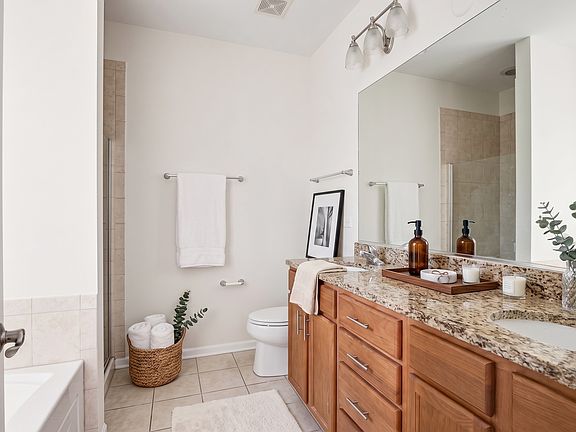 Master En-Suite Bathroom | Dual-Sink Vanity, Massive Mirror + Granite Counters