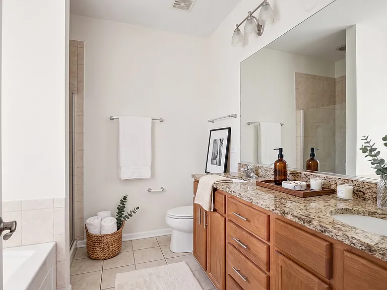 Master En-Suite Bathroom | Dual-Sink Vanity, Massive Mirror + Granite Counters