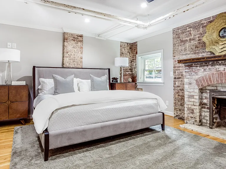 Large, beautiful bedroom with fireplace