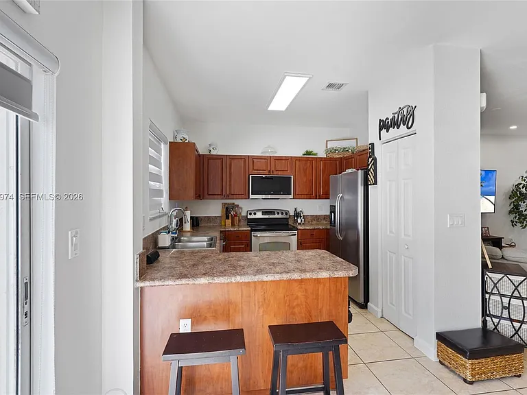 8897 SW 225th St — Photo 12