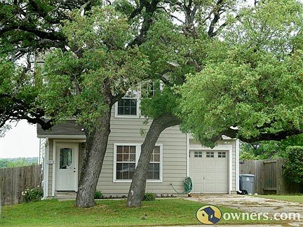 4 Bedroom home on tree-covered lot