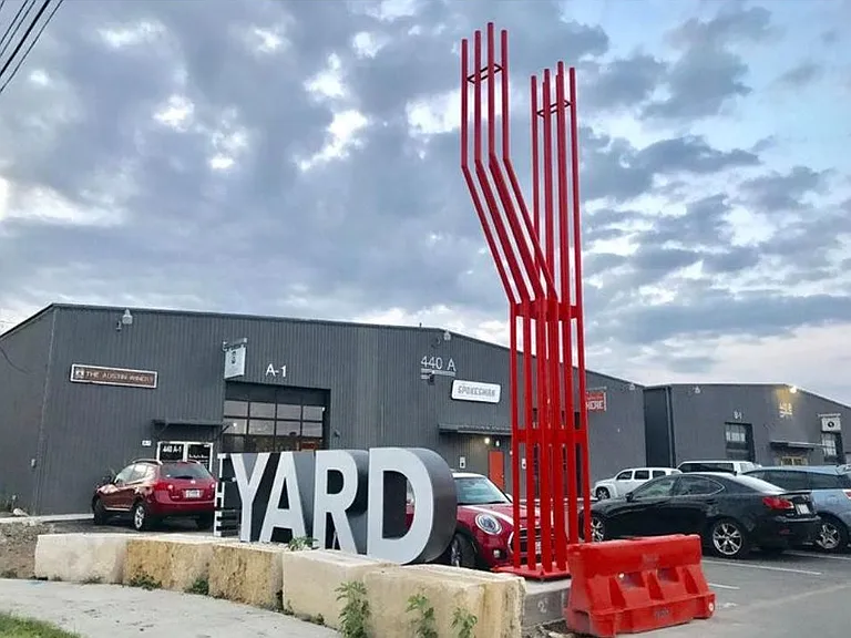 The Yard is a 6 minute walk: Spokesman, Austin Winery, Texas Sake, Whiskey Still, St. Elmo Brewing with Spicy Boys food truck, Wooly's Sand Volleyball.