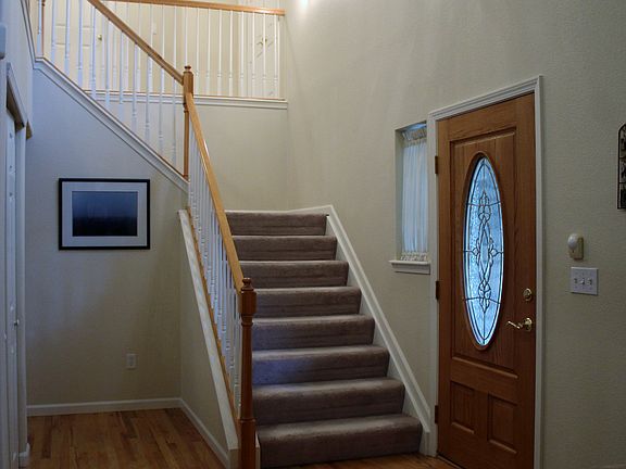 Entry with hardwood floors