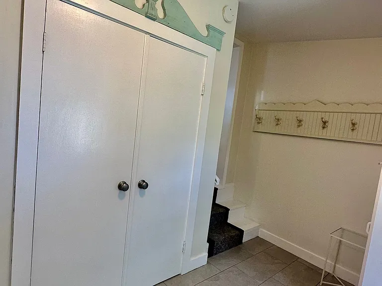 Mudroom entrance with plenty of storage.