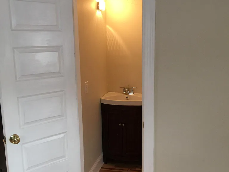 Powder under stairs.