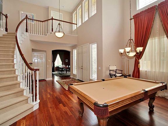 Formal Dining Area, currently occupied with a Pool Table.